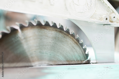 Macro catch of blade on circular saw photo