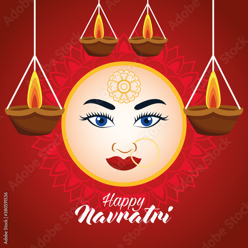 happy navratri celebration card with beautiful goddess face and candles hanging