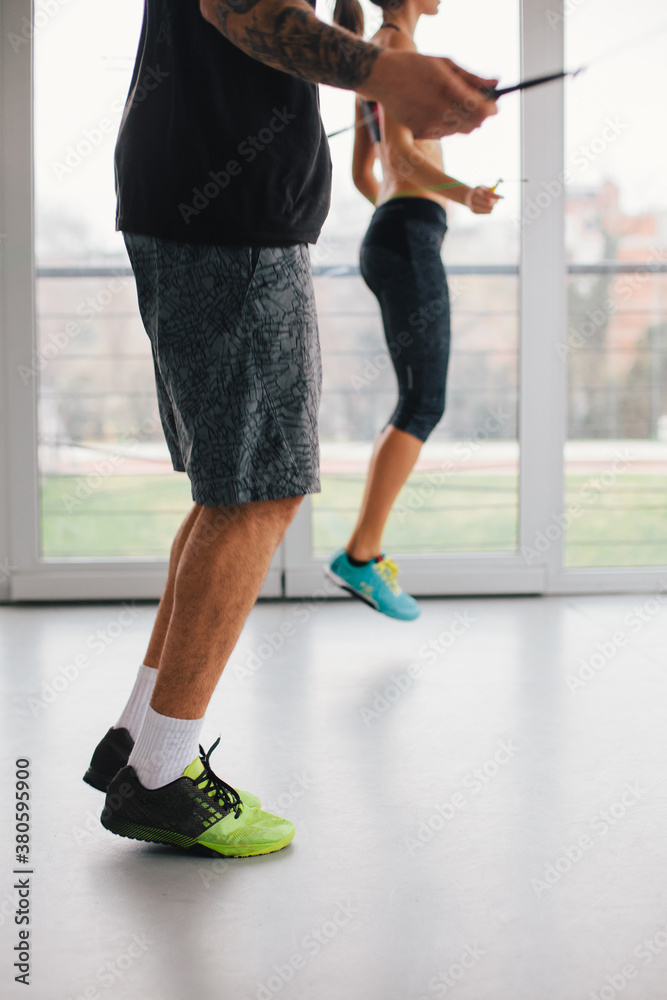 Man and woman training in teh gym Man and woman training in teh gym