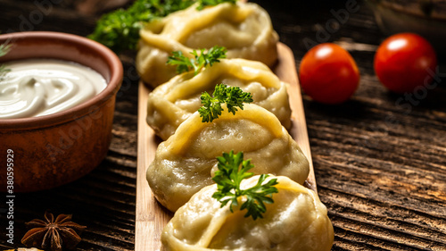 Traditional Turkish Manti with yoghurt. Manti. Traditional meat dish of the peoples of Central Asia