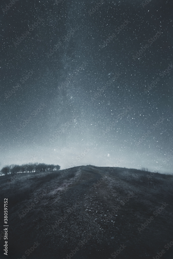 Winding Path Up Hill with Starry Sky
