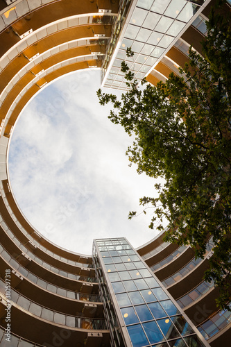 Modern round luxury apartment building photo