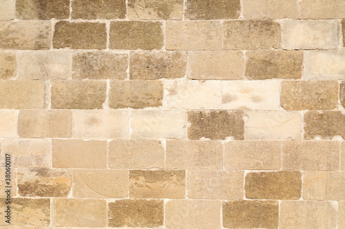 Muro con mattoni di pietra leccese photo