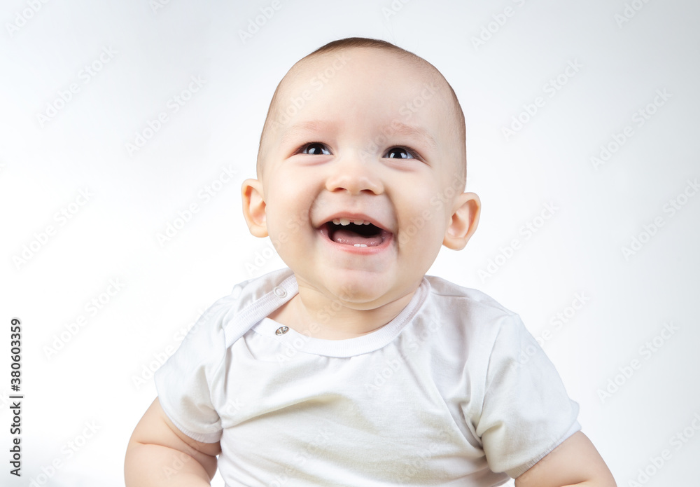 Photo of looking up eleven-month-old baby on a white background