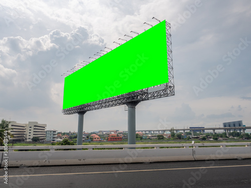 Empty billboard in front of beautiful cloudy sky in a rural location 
