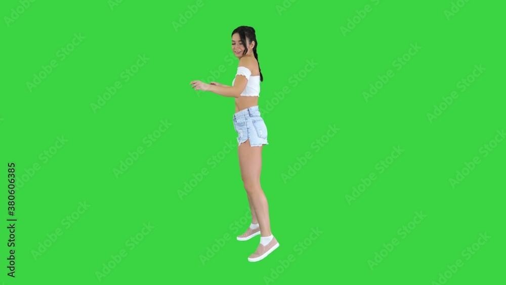 Beautiful Latin woman dancing on a Green Screen, Chroma Key. Beautiful Latin woman dancing on a Green Screen, Chroma Key.
