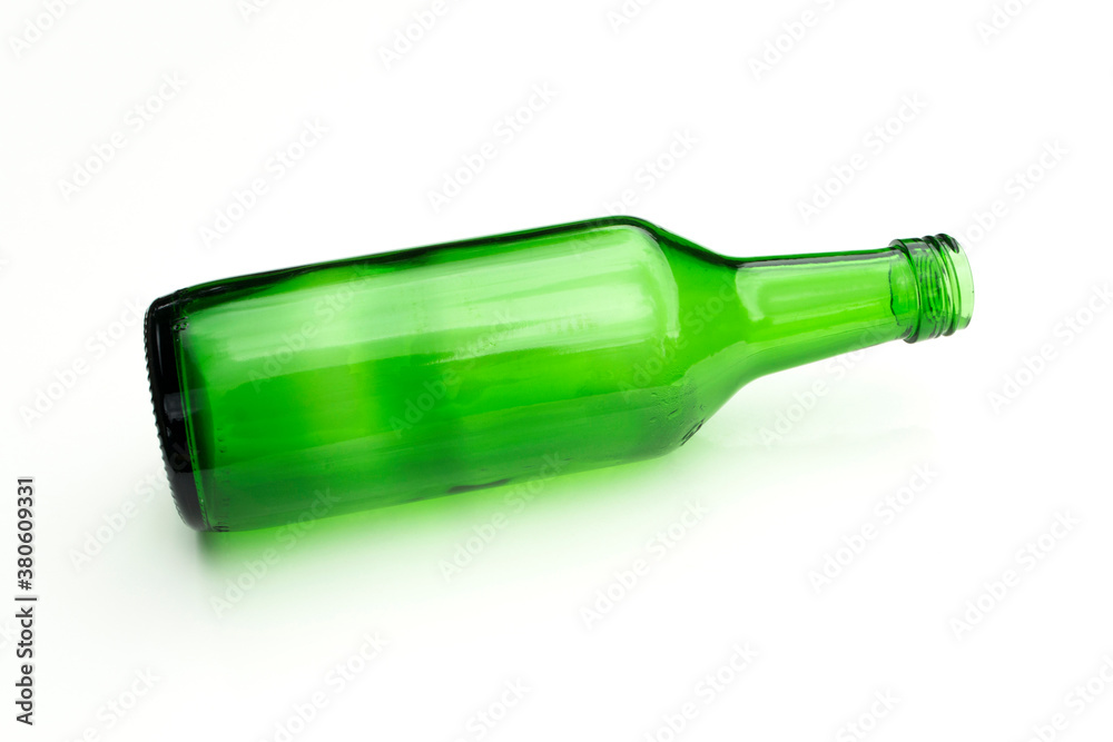 Green glass bottle on white background. Green glass bottle on white background.