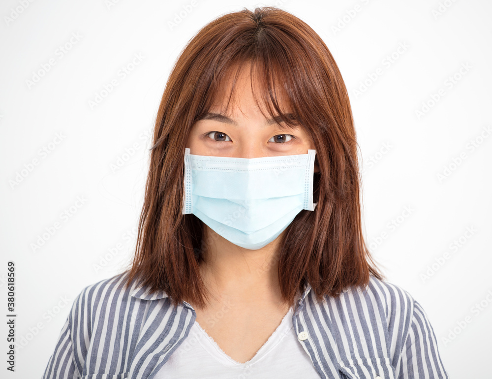 Close up portrait of teenage Asian girl wear medical mask Close up portrait of teenage Asian girl wear medical mask