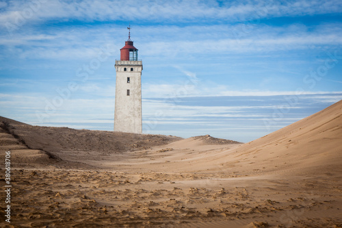 Lighthouse on beach in Denmark © Johny