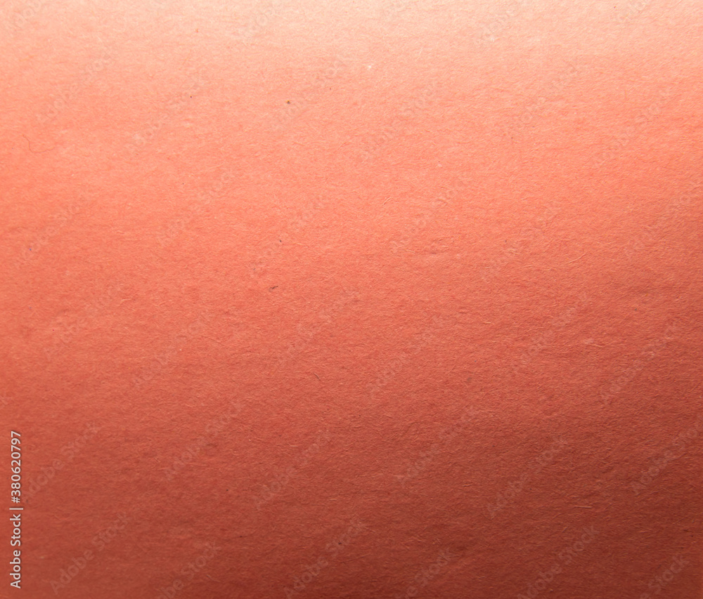 Texture of orange stationery on macro photo Texture of orange stationery on macro photo