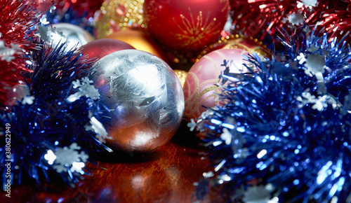 Christmas decorations for the tree on a wooden table