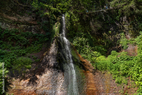 Sankenbach Wasserfall bei Baiersbronn im Schwarzwald, Deutschland im sonnigen Sommer mit wenig Wasser photo