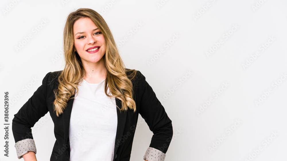 Young caucasian business woman isolated on white background Young caucasian bussines womanconfident keeping hands on hips. Young caucasian business woman isolated on white background Young caucasian bussines womanconfident keeping hands on hips.