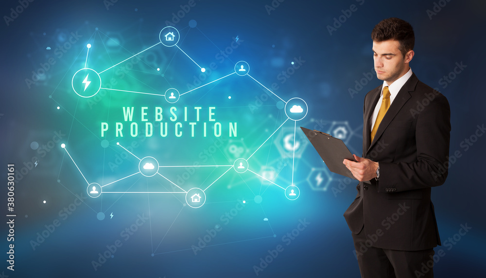 Businessman in front of cloud service icons with WEBSITE PRODUCTION inscription, modern technology concept Businessman in front of cloud service icons with WEBSITE PRODUCTION inscription, modern technology concept