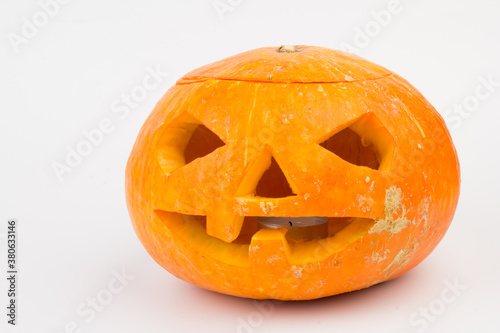 Halloween pumpkin head jack lantern on white background