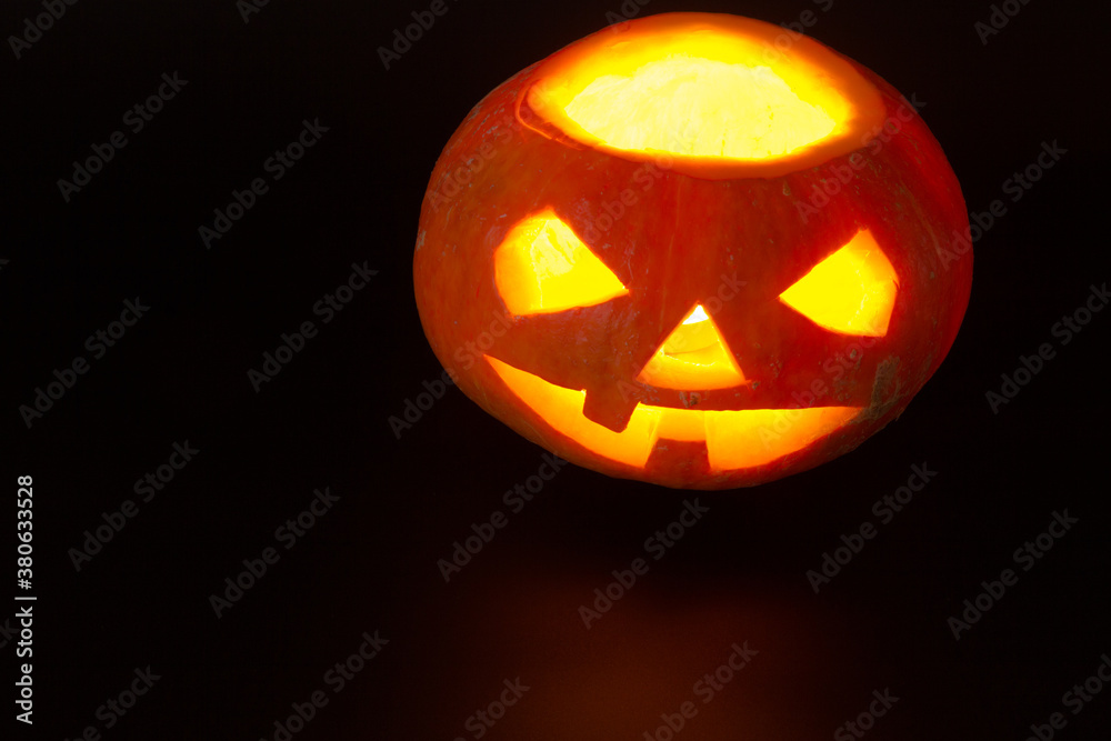 Halloween pumpkin head jack lantern on dark background Halloween pumpkin head jack lantern on dark background