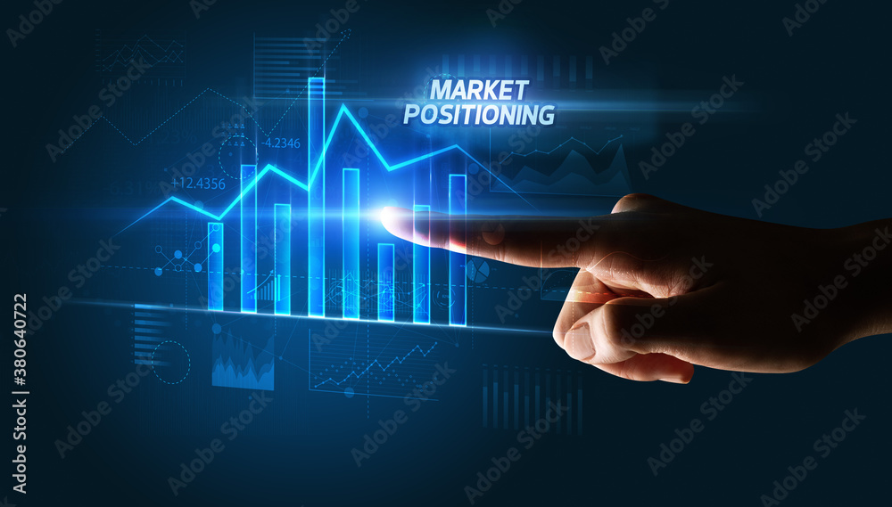 Hand touching MARKET POSITIONING button, business concept Hand touching MARKET POSITIONING button, business concept