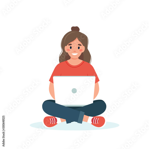 Woman with a laptop working, student or freelancer concept