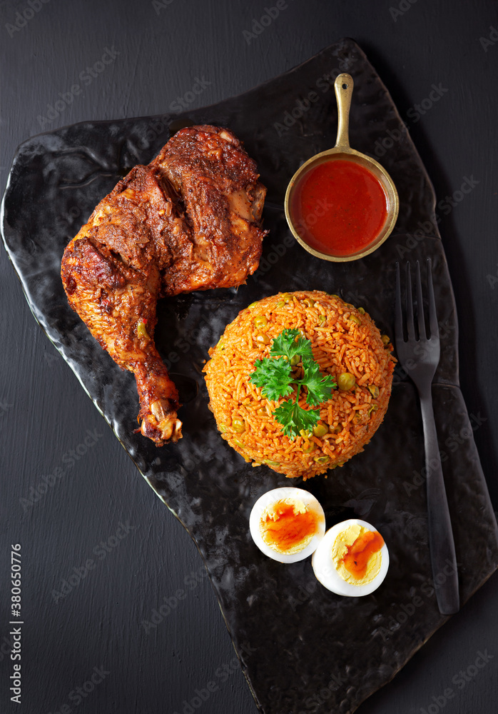 Jollof Peacock rice with beef, boiled egg and shito sauce Peacock® Rice