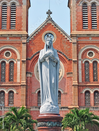 Statue in front of the Cathedral of Notre Dame de Saigon