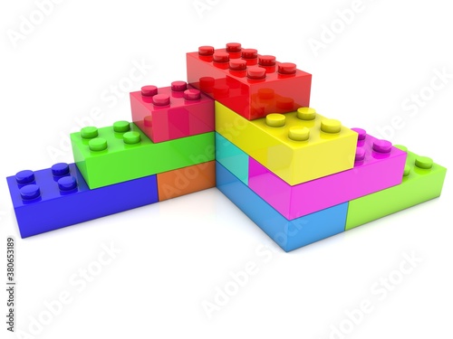 Toy bricks are stacked in an abstract construction
