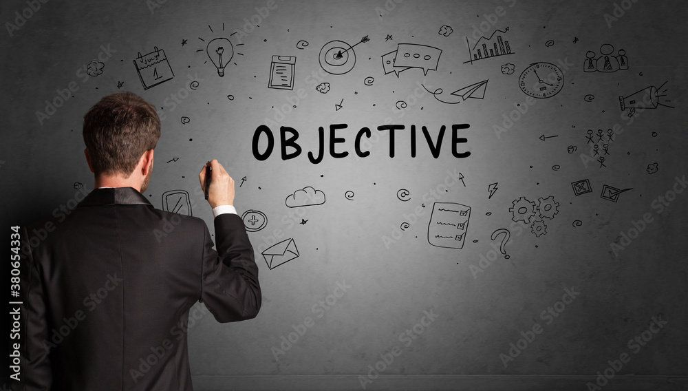 businessman drawing a creative idea sketch with OBJECTIVE inscription, business strategy concept businessman drawing a creative idea sketch with OBJECTIVE inscription, business strategy concept