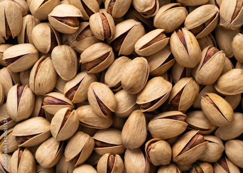 Pistachios with shell as full background