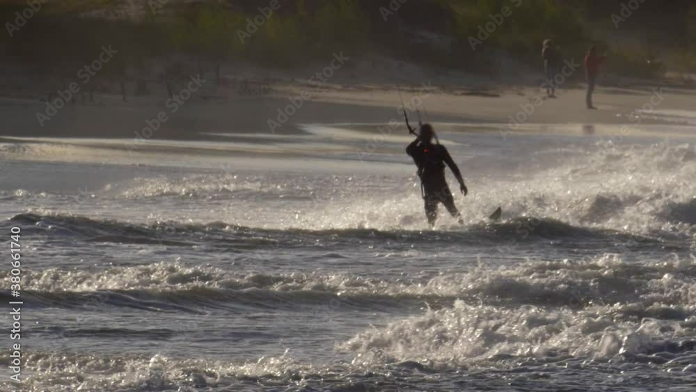 Kitesurfer Riding Heavy Storm Waves on Baltic Sea Slow Motion Kitesurfer Riding Heavy Storm Waves on Baltic Sea Slow Motion