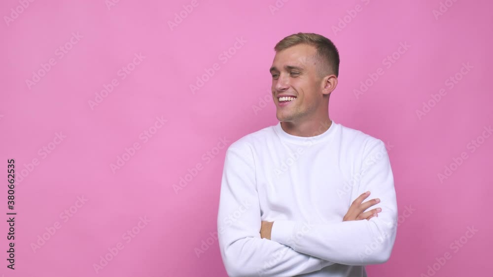Young caucasian man smiling confident with crossed arms Young caucasian man smiling confident with crossed arms