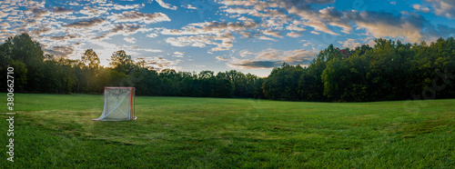 фотографія Panorama of a lawn field with lacrosse goals stored and locked together in Veter