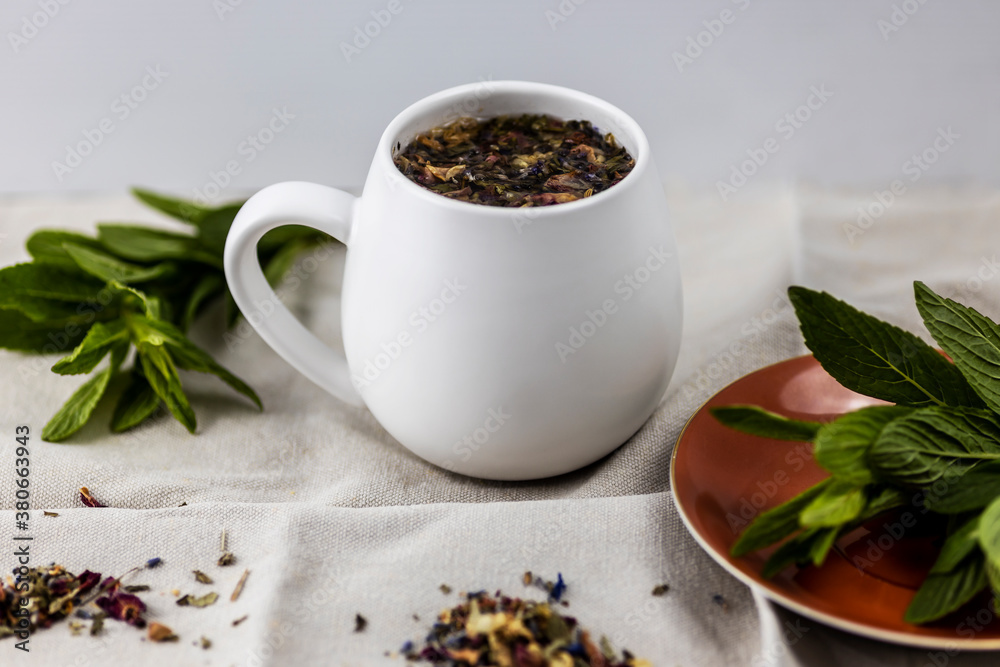cup of herbal tea on rustic tea towel