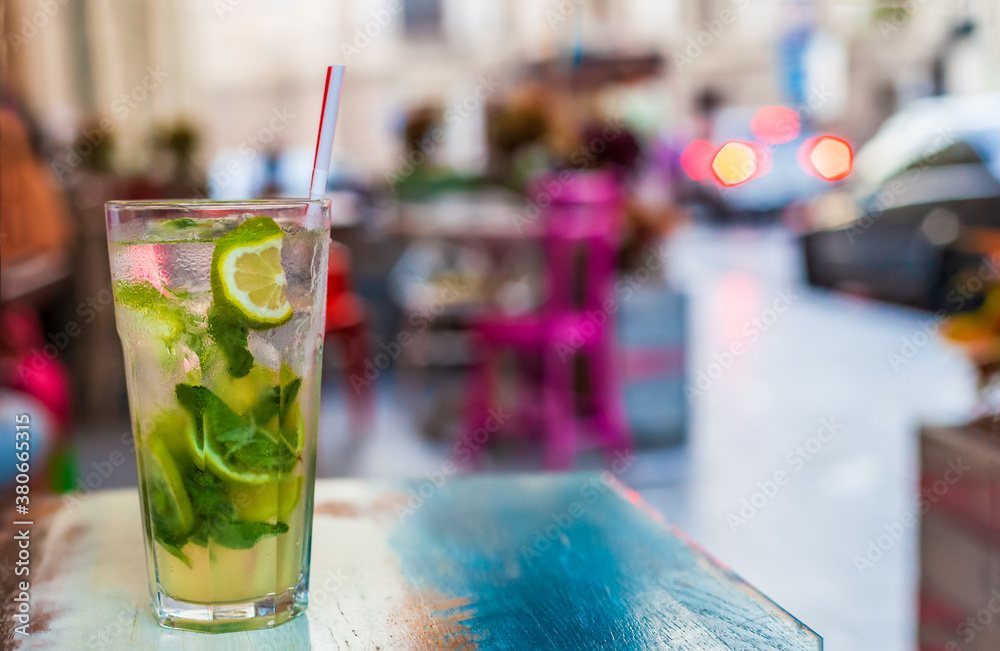 Non-alcoholic or alcoholic mojito on table at summer cafe Non-alcoholic or alcoholic mojito on table at summer cafe