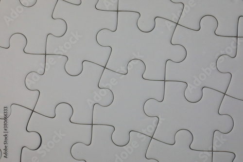 Connected puzzle pieces © Douglas