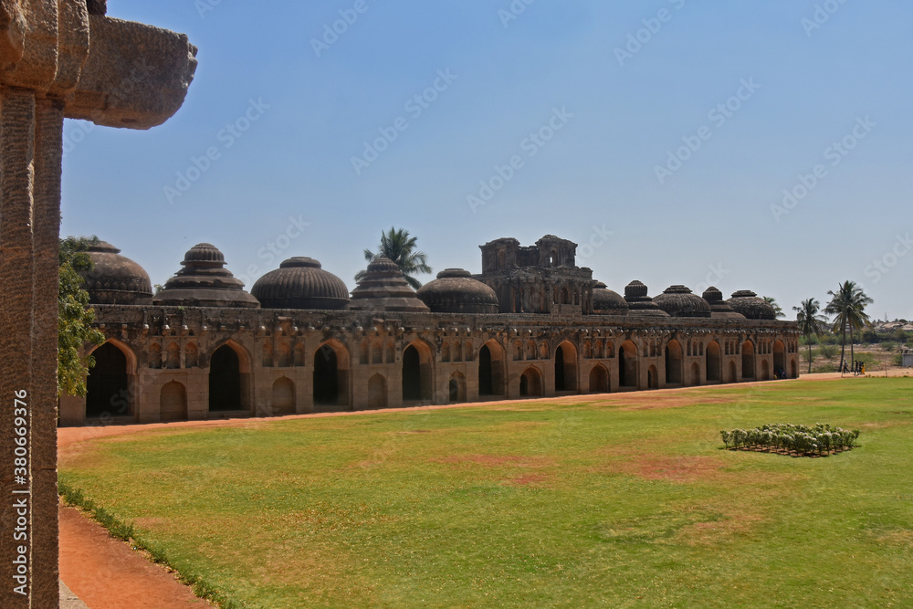 Ancient ruins of the Royal Elephant Stables at Hampi from 14th century Vijayanagara kingdom. The ancient city of Vijayanagara, Hampi, Karnataka, India.