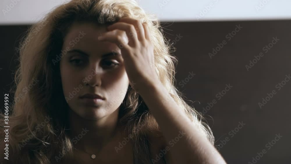 young attractive woman wakes up and sleepy gets out of bed young attractive woman wakes up and sleepy gets out of bed