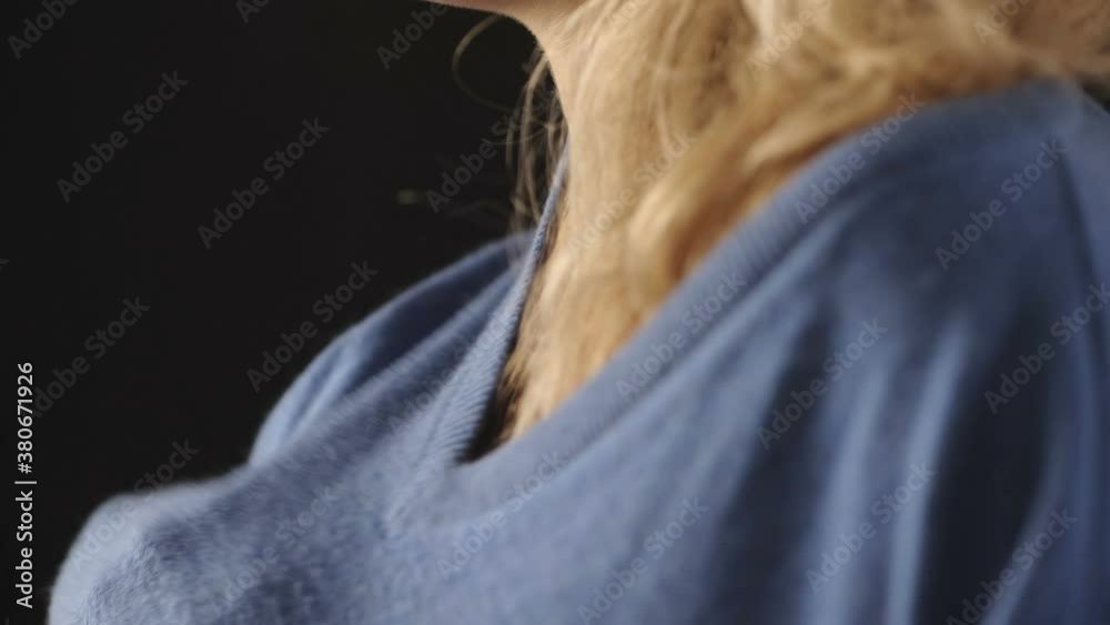 portrait of young woman  gets dressed and gets ready to leave the house