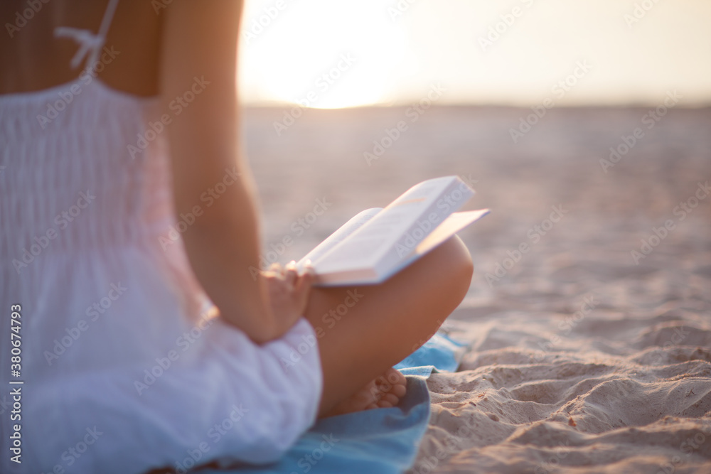 Anonymous Woman Reading a Book at Sunset Anonymous Woman Reading a Book at Sunset