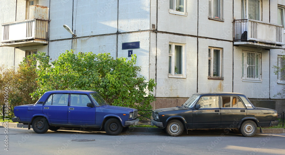 Soviet Lada cars are parked at a residential building, Iskrovsky Prospekt, Saint Petersburg, Russia, September 2020