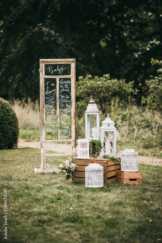 Boho Wedding Decoration With White Lanters and Wooden Boxes