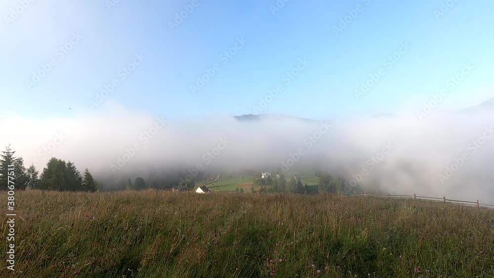 Morning fog dissipates in the mountains Morning fog dissipates in the mountains