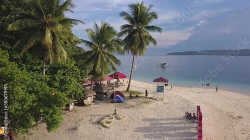 Amazing sunset on the beautiful beach in Samal philippines photo