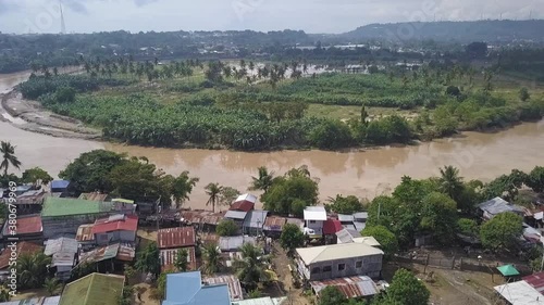 Long and wide river flow. Slow mo Aerial footage. photo