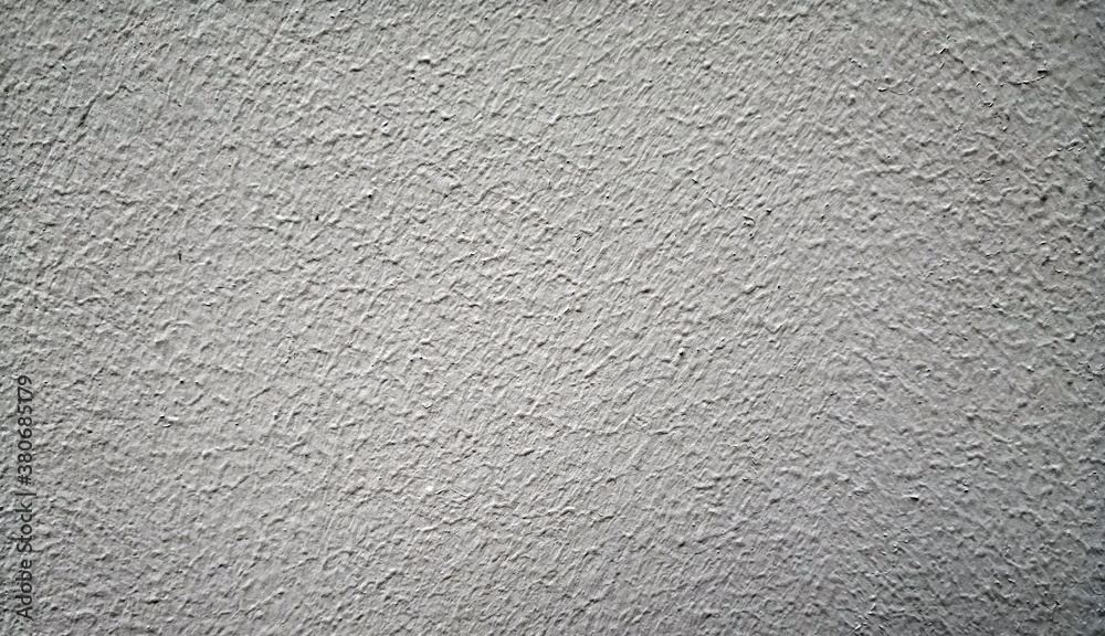 Grungy gray background. Rough uneven texture Grungy gray background. Rough uneven texture