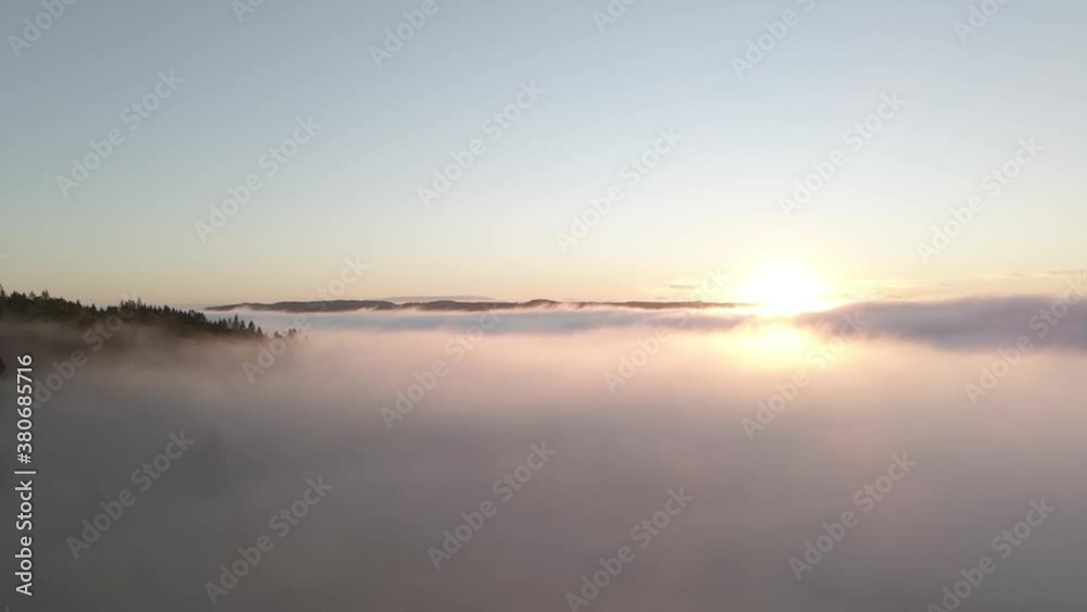 Drone shot over Borås Sweden. Crossing the freeway, trees and a lake. Drone shot over Borås Sweden. Crossing the freeway, trees and a lake.