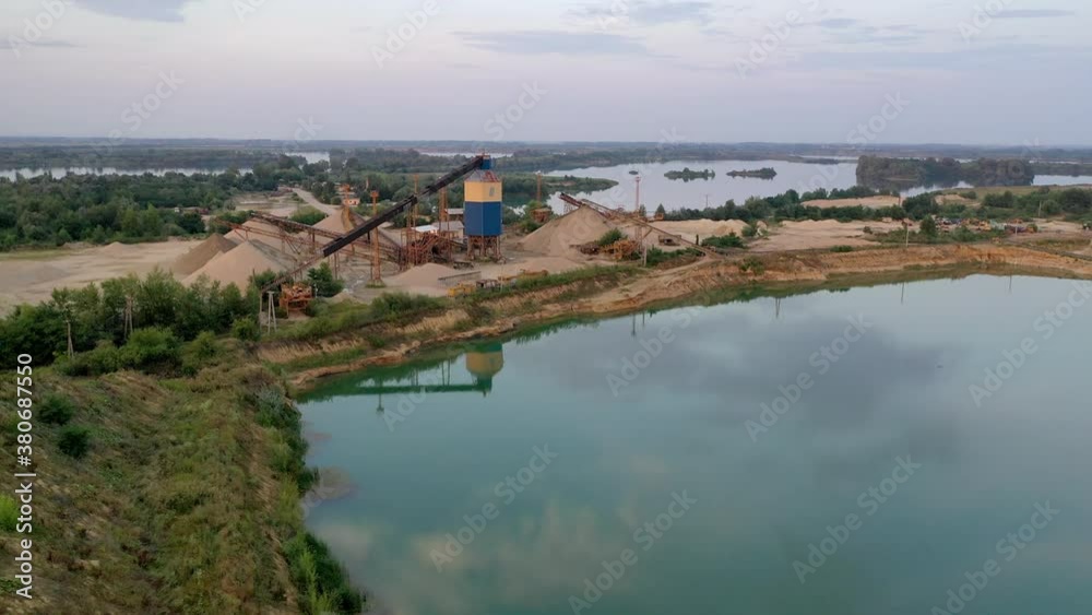 Aerial dolly in, Sand quarry, to divide the dredged material into different fractions at sand extraction. Lake side Aerial dolly in, Sand quarry, to divide the dredged material into different fractions at sand extraction. Lake side