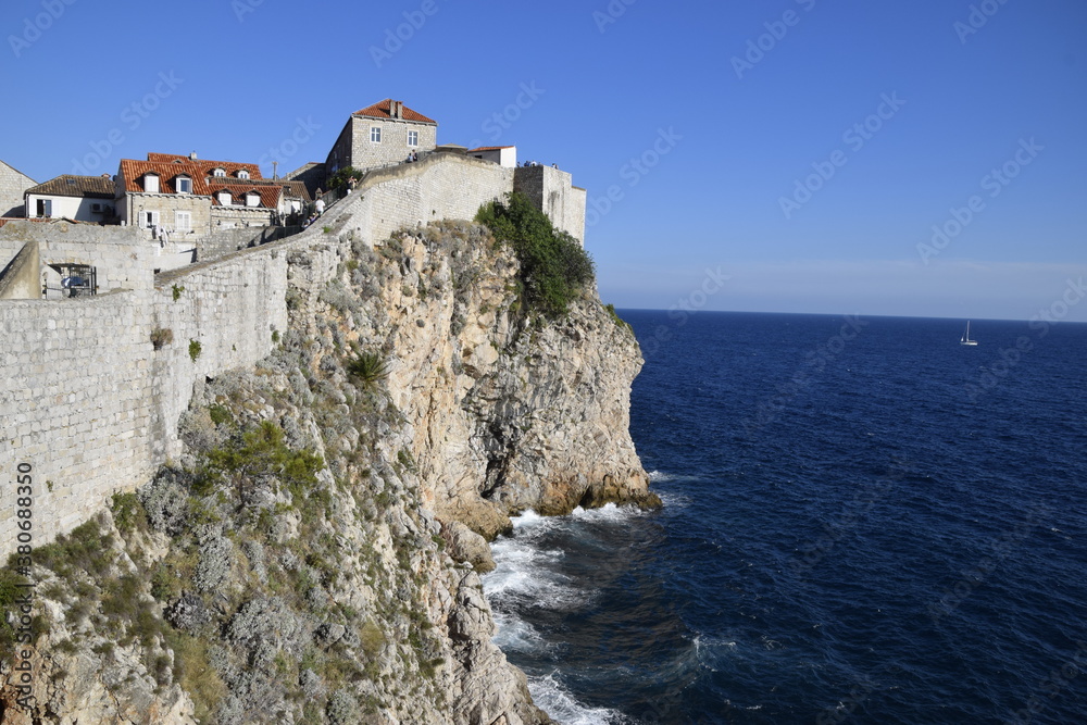 Stone wall over the cliffs in Dubrovnik
