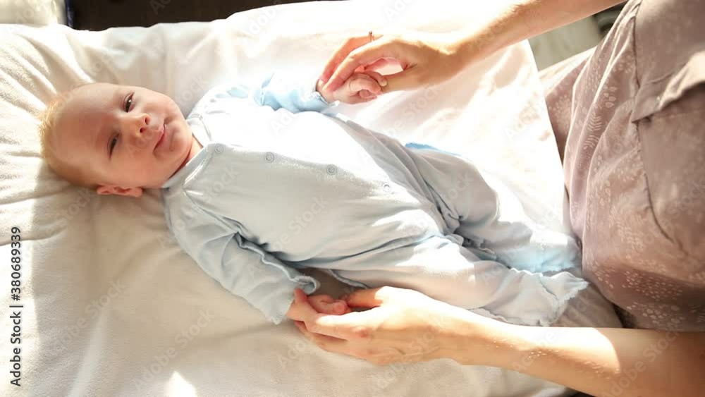 Doing exercises for a newborn baby's little hands Doing exercises for a newborn baby's little hands