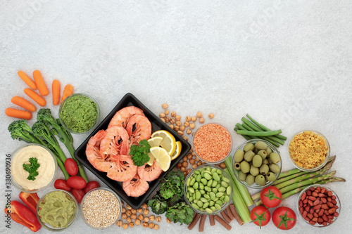 Fototapeta Naklejka Na Ścianę i Meble -  Low glycemic health food for diabetics with vegetables,  seafood, dips, nuts & pasta. All foods below 55 on the GI index. High in antioxidants, vitamins, minerals, protein, omega 3 & smart carbs. 