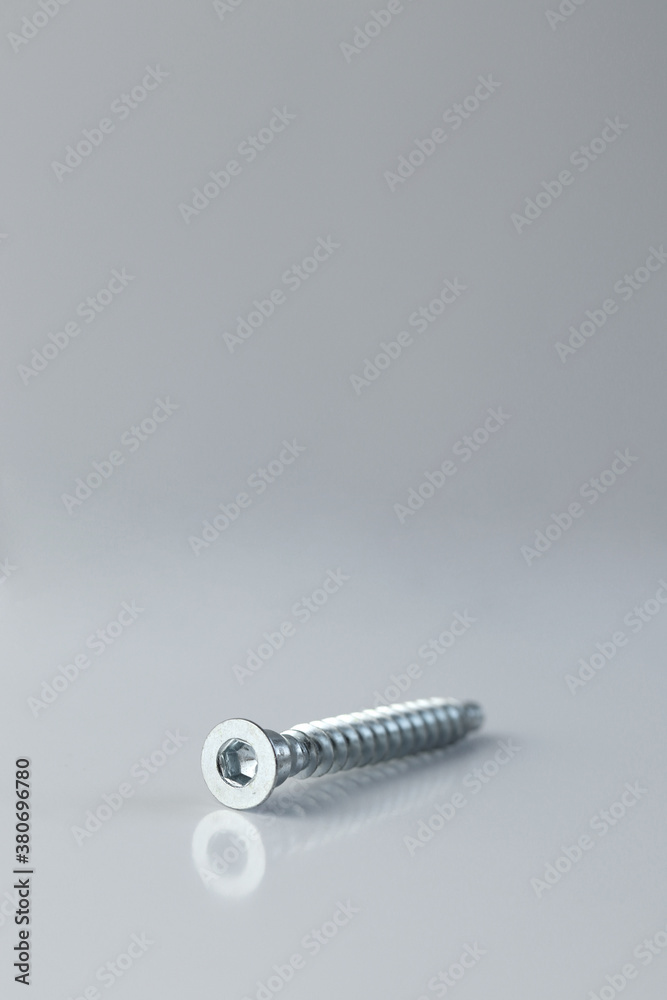 The black screws. Black screws isolated on a white background. The black screws. Black screws isolated on a white background.