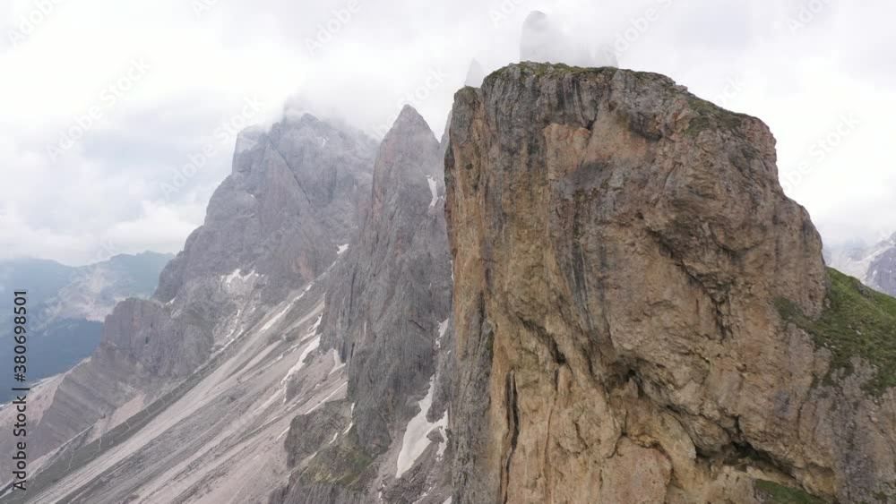 Flying past steep ridge reveals rugged scenery of the Seceda peaks in the Dolomites mountains in Italy
Flying past steep ridge reveals rugged scenery of the Seceda peaks in the Dolomites mountains in Italy